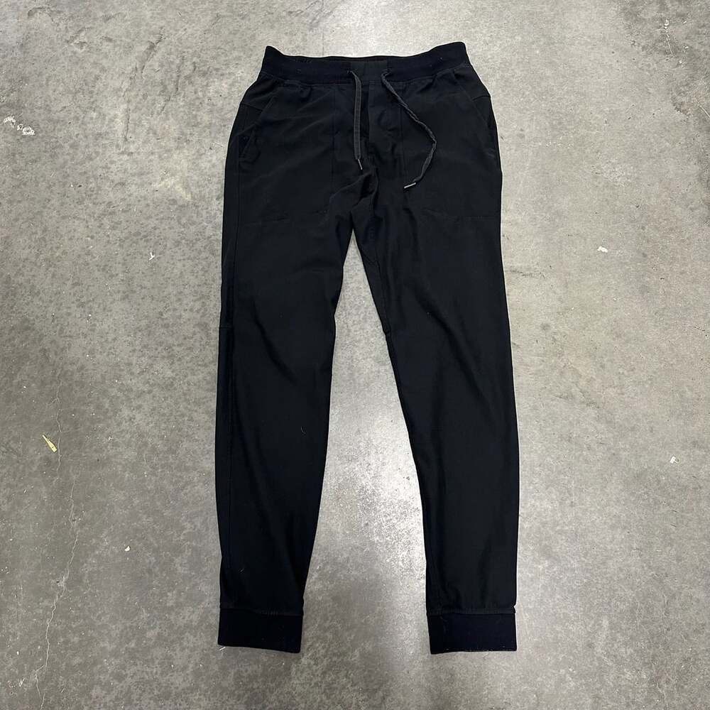 Lululemon Surge Jogger Pants Size M Stretch Running Athletic Tapered